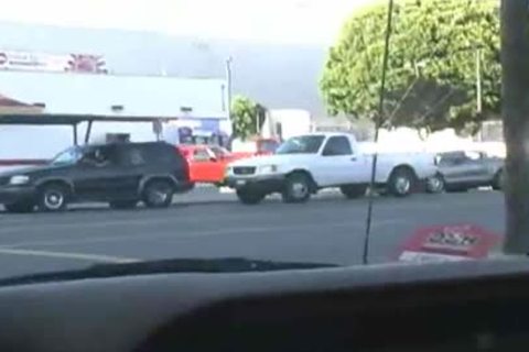 Young bare bends over