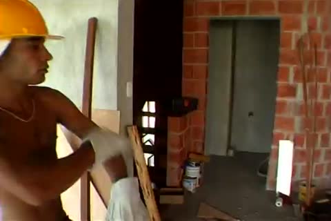 On Construction web page Boss Watches As Two Male Workers plow