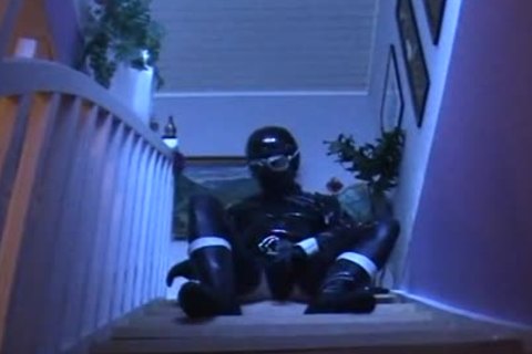 BDSM together with wearing latex