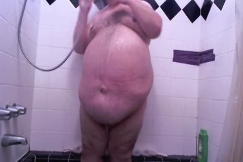 overweight boy taking a shower