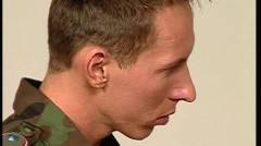 Three Army men pound Each Otthis manr Back In Tthis man Barracks