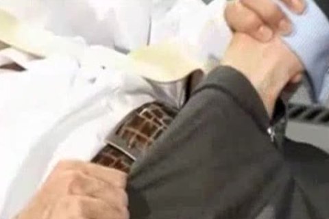 Dr. Examines Patient