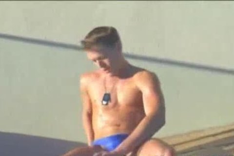 lascivious Blond Model In Speedos