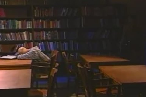 Vintage Muscled mans In Leather Stretching pooper In Quiet Library