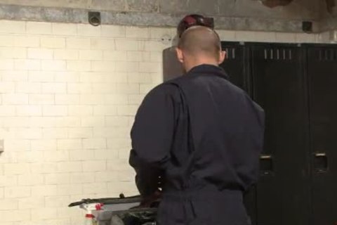 Janitor bounds man In Locker Room