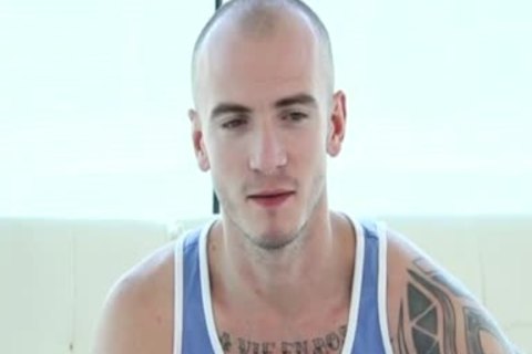 wild HUNK WITH TATTOOS SHOWS OFF greetingsS ramrod RIDING SKILLS