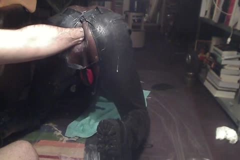 Athletic hunk masturbates with big dildo