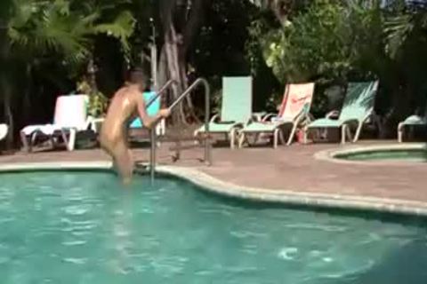 Tropical cock sucking threesome - Factory video scene