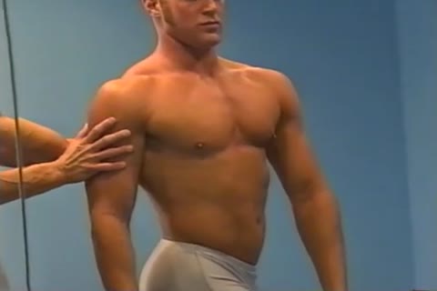 coach training his boy Flexing And Posing