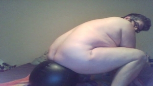 Just Me enjoying Some Of My toys In My butt.  Bouncing On My dark Ball.