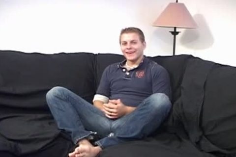 This gay blonde Jerks Off On The daybed