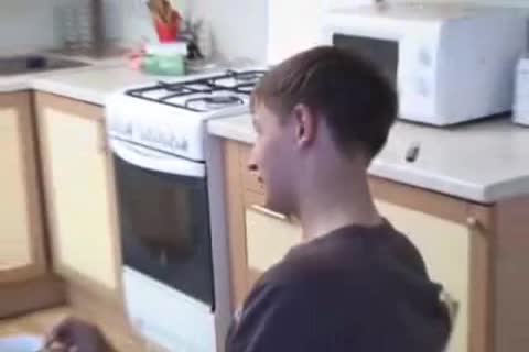 dad bonks His lad In Kitchen