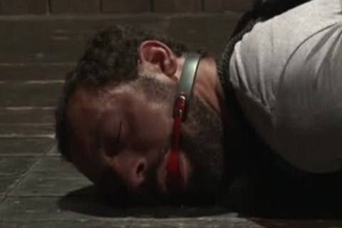 Basement taskmaster pokes unrepining chap