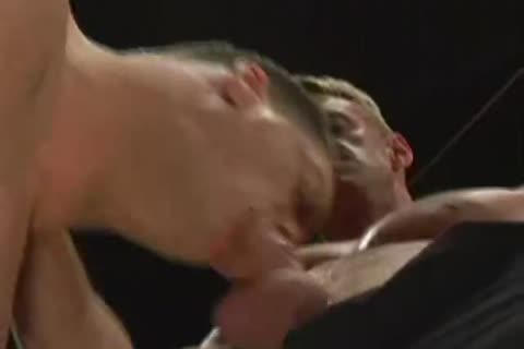 Two Muscle twinks In Leather Boots