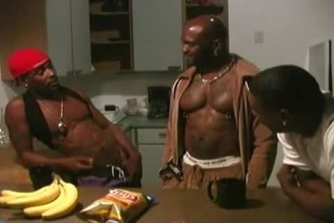 Three black men Sharing A pumped up lad