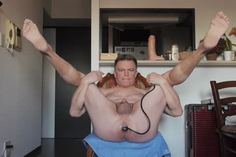 mature Queer Stretches His daddy chocolate hole With Inflatable butthole