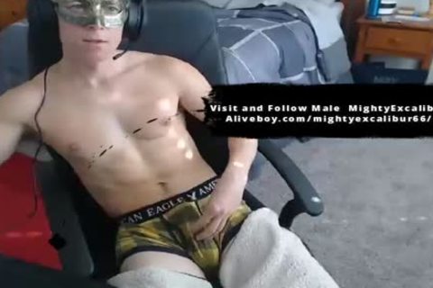 Masked chap stroking His nice penis