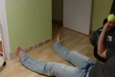 ballbusting game with tennis ball in jeans