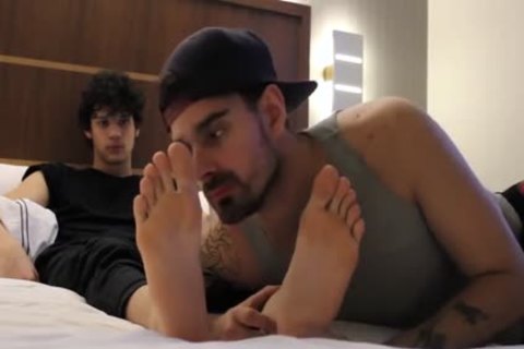 Young latino gay barefoot feet teasing scene