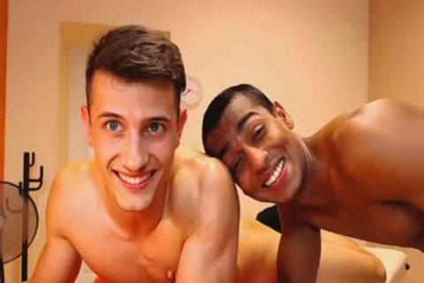 Interracial pair caresses Each Other