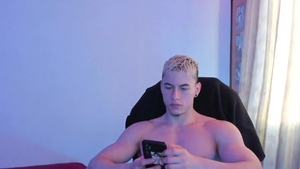 pumped up blond man jerking off