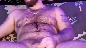 Bearded Daddy With Tattoos And bushy Chest Strokes Her dong On cam