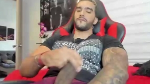 sexy Latino chap With Tattoos Strokes His darksome Monster rod