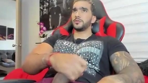 sexy Latino chap With Tattoos Strokes His darksome Monster rod