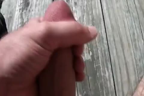Cumshot outdoors amongst amateur