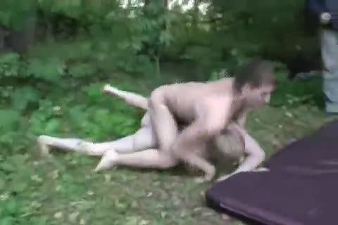 Two lads wrestle