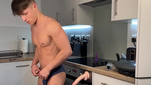 kinky man fucks Himself With In Kitchen