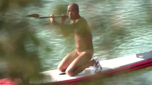 A CHINESE MUSCLE BEAR PLAYING SUP bare