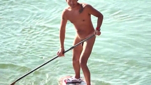 A CHINESE MUSCLE BEAR PLAYING SUP bare