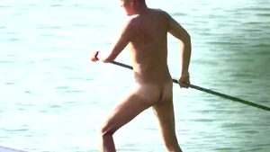 A CHINESE MUSCLE BEAR PLAYING SUP bare