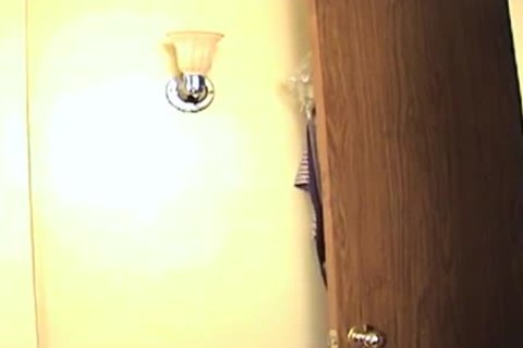 nice looking black studs screwing on a bed