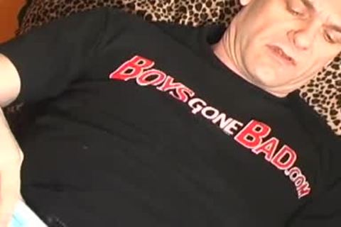 daddy lays on the floor and uses a sex tool