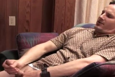 tight man jerks his weenie while watching porn